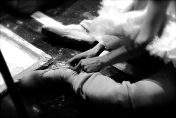 ballet photography, backstage, dancer, toe shoes, legs, black and white photograph