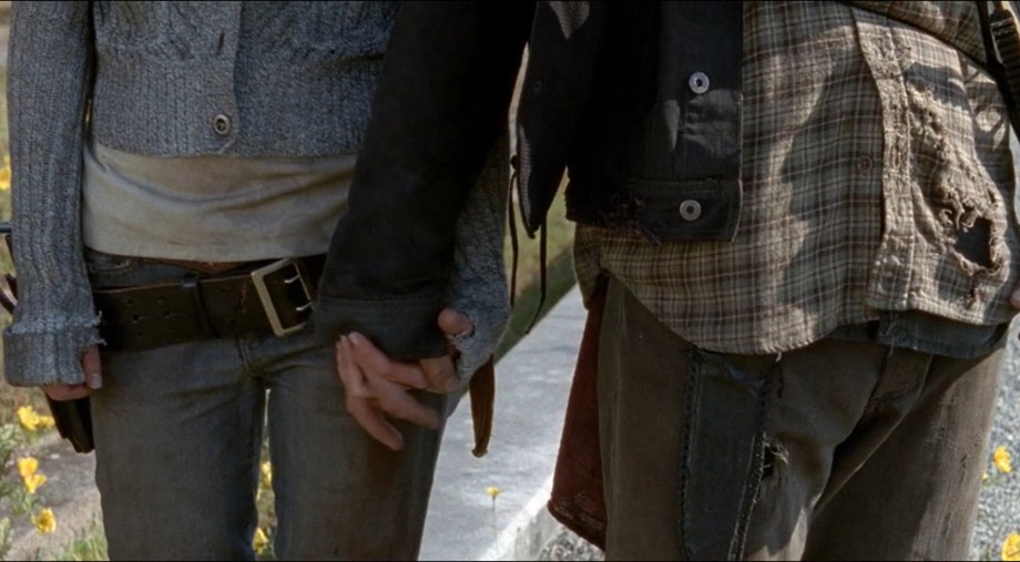 daryl-and-beth-hold-hands